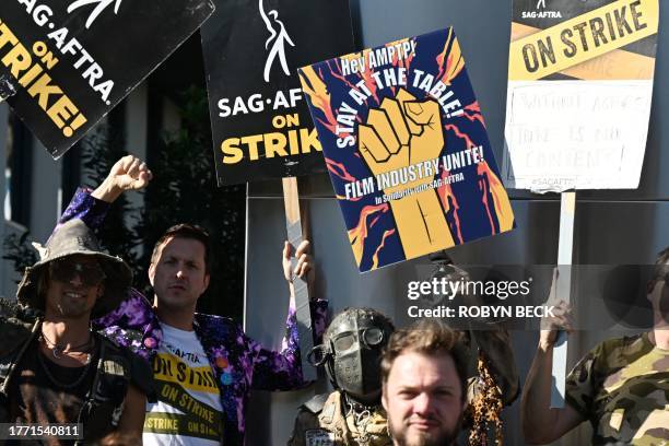 Members and their supporters picket outside Netflix during their strike against the Hollywood studios, in Hollywood, California, on November 8, 2023....