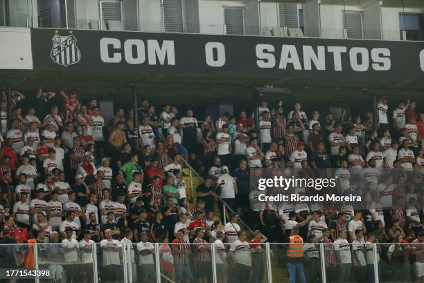 Fans of Sao Paulo cheer their team during the match between Sao Paulo and Red Bull Bragantino as part of Brasileirao Series A 2023 at Urbano Caldeira...