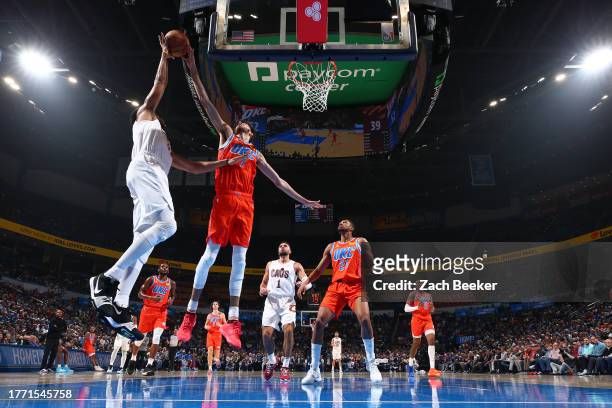 Chet Holmgren of the Oklahoma City Thunder blocks the shot by Jarrett Allen of the Cleveland Cavaliers during the game on November 8, 2023 at Paycom...