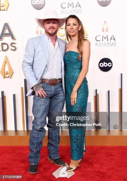 Cody Johnson and Brandi Johnson at The 57th Annual CMA Awards at Bridgestone Arena in Nashville, Tennessee on November 8, 2023.