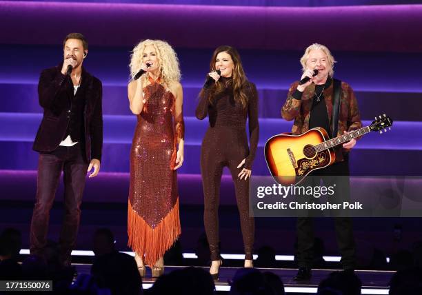 Jimi Westbrook, Kimberly Schlapman, Karen Fairchild and Phillip Sweet of Little Big Town perform onstage at The 57th Annual CMA Awards at Bridgestone...
