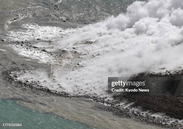 Photo taken from a Kyodo News plane on Oct. 30 shows plumes rising from the waters off Iwoto Island, previously known as Iwojima, in the Pacific...