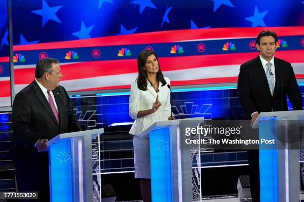 Former United Nations Ambassador Nikki Haley, center, answers a question as former New Jersey Gov. Chris Christie, left, and Florida Gov. Ron...