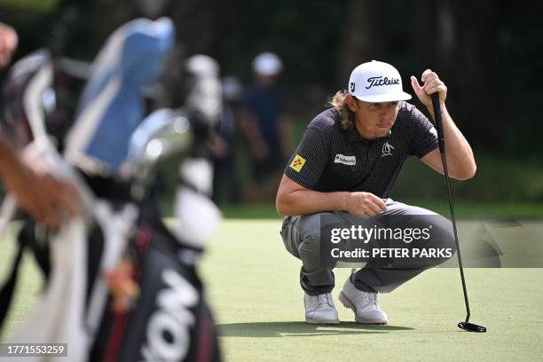 Australia's Cam Smith lines up a shot on day one of the Hong Kong Open golf tournament at Fanling Golf Course in Hong Kong on November 9, 2023.