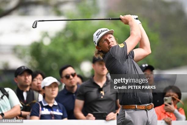 Australia's Cam Smith hits a shot on day one of the Hong Kong Open golf tournament at Fanling Golf Course in Hong Kong on November 9, 2023.