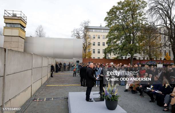 Crown Prince Haakon of Norway and Crown Princess Mette-Marit of Norway listen as Berlin's mayor Kai Wegner gives a speech during festivities at the...