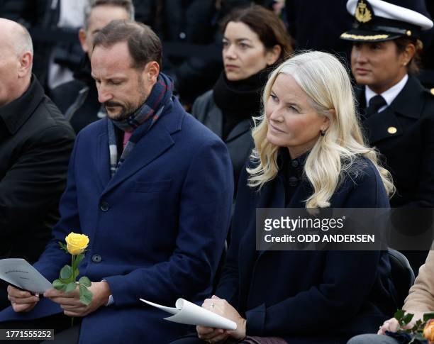 Crown Prince Haakon of Norway and Crown Princess Mette-Marit of Norway, attend a commemoration for the 34th anniversary of the fall of the Berlin...