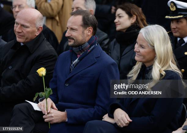 Berlin's mayor Kai Wegner, Crown Prince Haakon of Norway and Crown Princess Mette-Marit of Norway, attend a commemoration for the 34th anniversary of...