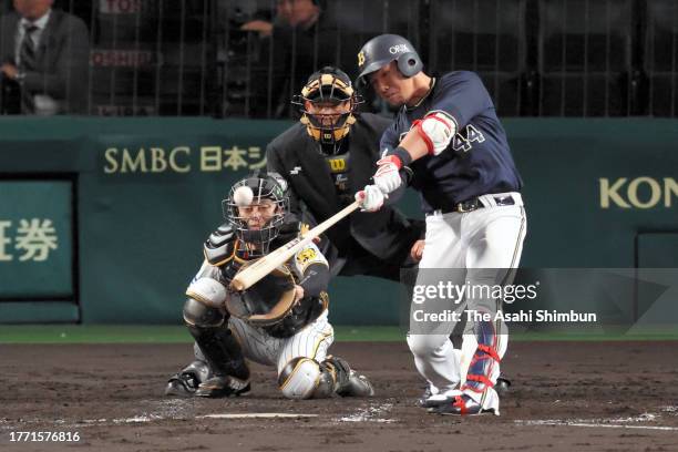 Yuma Tongu of the Orix Buffaloes hits a solo home run in the 4th inning against Hanshin Tigers during the Japan Series Game Three at Hanshin Koshien...