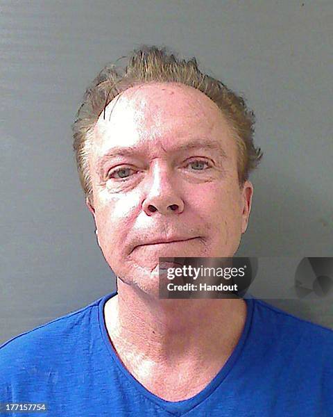 In this handout photo provided by the Schodack Police Department, David Cassidy is seen in a police booking photo after his arrest on charges of...