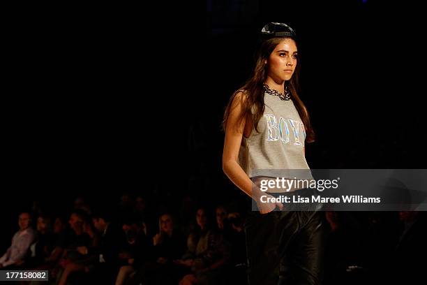 Model showcases designs by General Pants Co. On the runway at the General Pants show during Mercedes-Benz Fashion Festival Sydney 2013 at Sydney Town...