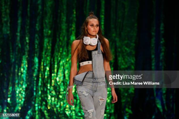 Model showcases designs by General Pants Co. On the runway at the General Pants show during Mercedes-Benz Fashion Festival Sydney 2013 at Sydney Town...