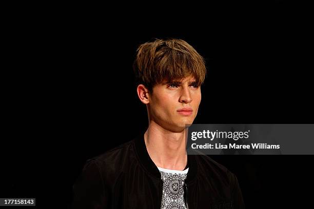 Model showcases designs by General Pants Co. On the runway at the General Pants show during Mercedes-Benz Fashion Festival Sydney 2013 at Sydney Town...