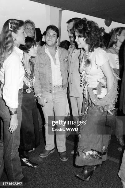 Terry McQueen, Neile Adams, Chad MdQueen, George Schlatter , and Jolene Schlatter attend an event at the Santa Monica Civic Auditorium in Santa...