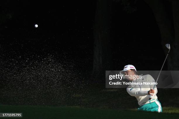 Sakura Koiwai of Japan hits out from a bunker on the 10th hole during the second round of the TOTO Japan Classic at the Taiheiyo Club's Minori Course...