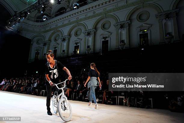 Models showcase designs by General Pants Co. On the runway at the General Pants show during Mercedes-Benz Fashion Festival Sydney 2013 at Sydney Town...