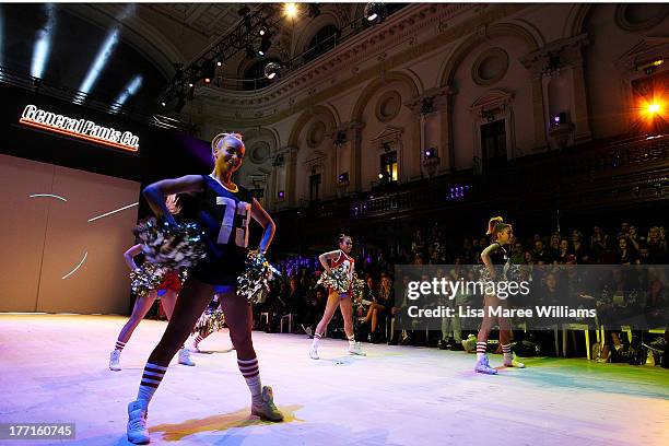 Models showcase designs by General Pants Co. On the runway at the General Pants show during Mercedes-Benz Fashion Festival Sydney 2013 at Sydney Town...