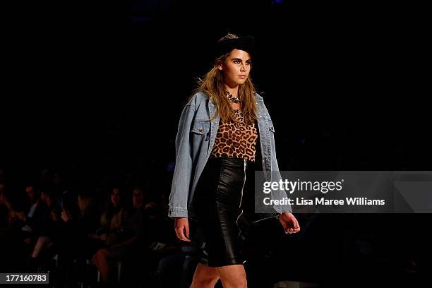 Model showcases designs by General Pants Co. On the runway at the General Pants show during Mercedes-Benz Fashion Festival Sydney 2013 at Sydney Town...