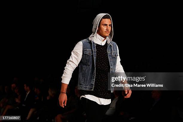 Model showcases designs by General Pants Co. On the runway at the General Pants show during Mercedes-Benz Fashion Festival Sydney 2013 at Sydney Town...