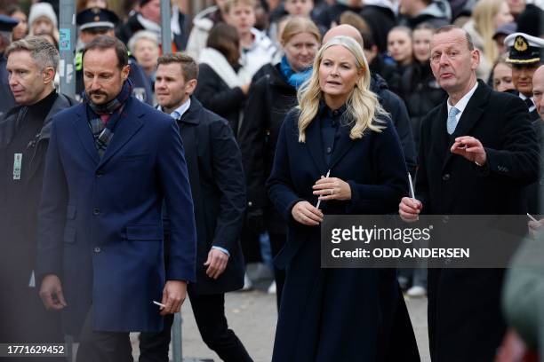 Crown Prince Haakon of Norway and Crown Princess Mette-Marit of Norway walk with Axel Klausmeier , director of the Berlin Wall Foundation, as they...