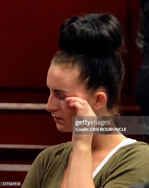 Irishwoman Michaella McCollum who was arrested along with Briton Melissa Reid at Lima's airport for carrying cocaine in their luggage, wipes a tear...