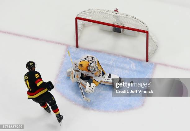 Kevin Lankinen of the Nashville Predators makes a save on Dakota Joshua of the Vancouver Canucks during their NHL game at Rogers Arena October 31,...