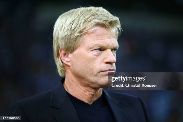 Oliver Kahn looks on prior to the UEFA Champions League Play-off first leg match between FC Schalke 04 and PAOK Saloniki at Veltins-Arena on August...