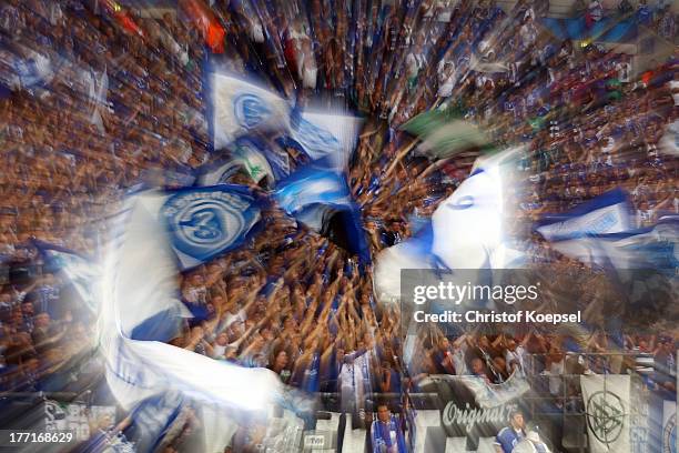 Fans of Schalke ave falgs prior to the UEFA Champions League Play-off first leg match between FC Schalke 04 and PAOK Saloniki at Veltins-Arena on...