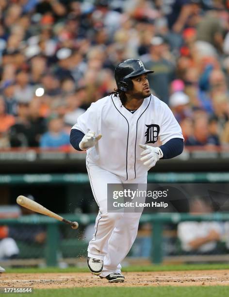 Prince Fielder of the Detroit Tigers hits a two run home run in the first inning scoring Andy Dirks during the first inning of the game against the...