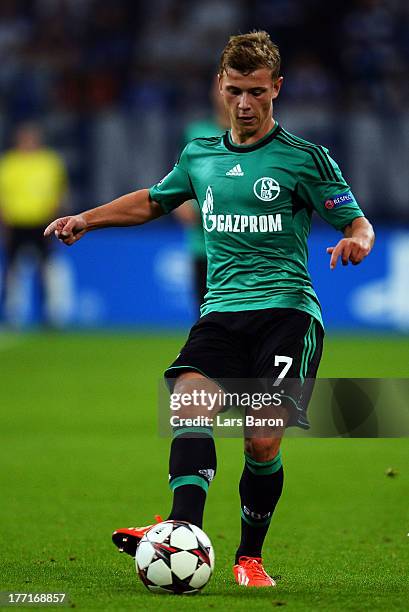 Max Meyer of Schalke runs with the ball during the UEFA Champions League Play-off first leg match between FC Schalke 04 and PAOK Saloniki at...