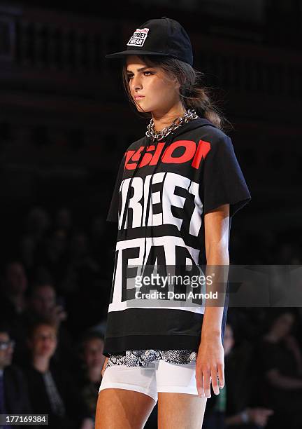 Model showcases designs on the runway at the General Pants show during Mercedes-Benz Fashion Festival Sydney 2013 at Sydney Town Hall on August 21,...
