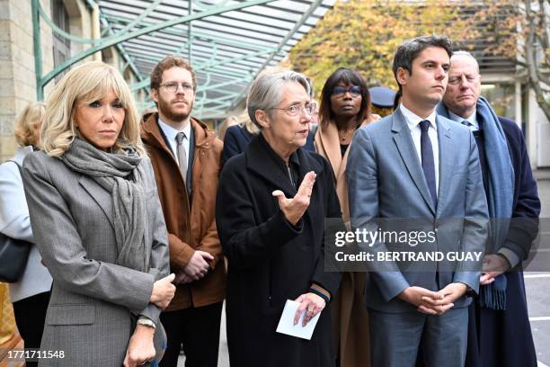 French Prime Minister Elisabeth Borne delivers a speech next to French first lady Brigitte Macron and French Education and Youth Minister Gabriel...