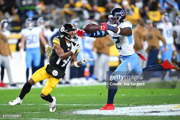 Azeez Al-Shaair of the Tennessee Titans breaks up a pass intended for Calvin Austin III of the Pittsburgh Steelers in the second quarter at Acrisure...