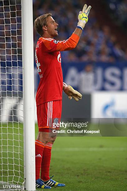 Timo Hildebrand of Schalke issues instructions during the UEFA Champions League Play-off first leg match between FC Schalke 04 and PAOK Saloniki at...