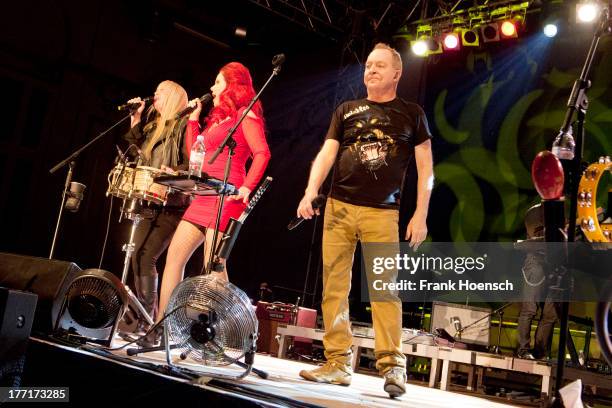 Cindy Wilson, Kate Pierson and Fred Schneider of The B-52's perform live during a concert at the Huxleys on August 21, 2013 in Berlin, Germany.