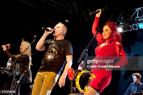 Cindy Wilson, Fred Schneider and Kate Pierson of The B-52's perform live during a concert at the Huxleys on August 21, 2013 in Berlin, Germany.