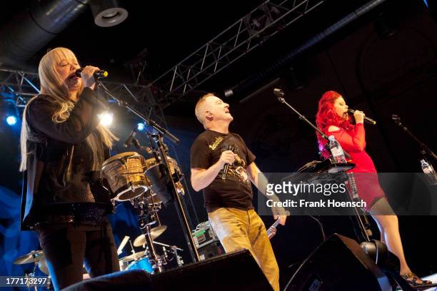 Cindy Wilson, Fred Schneider and Kate Pierson of The B-52's perform live during a concert at the Huxleys on August 21, 2013 in Berlin, Germany.