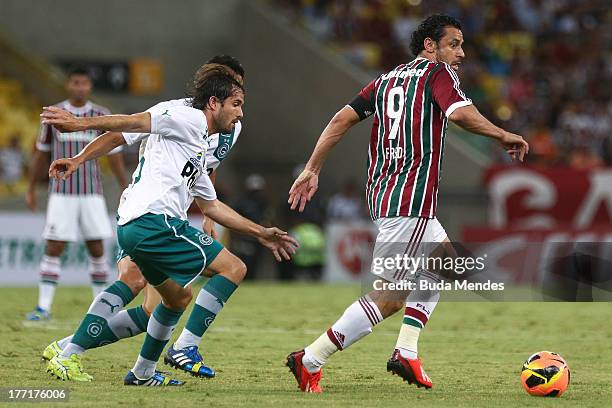 Fred of Fluminense struggles for the ball during a match between Fluminense and Goias as part of Brazilian Cup 2013 at Maracana Stadium on August 21,...