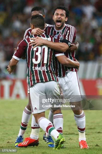 Samuel and Fred of Fluminense celebrate a scored goal during a match between Fluminense and Goias as part of Brazilian Cup 2013 at Maracana Stadium...