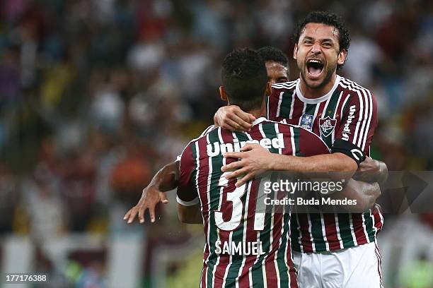 Samuel and Fred of Fluminense celebrate a scored goal during a match between Fluminense and Goias as part of Brazilian Cup 2013 at Maracana Stadium...
