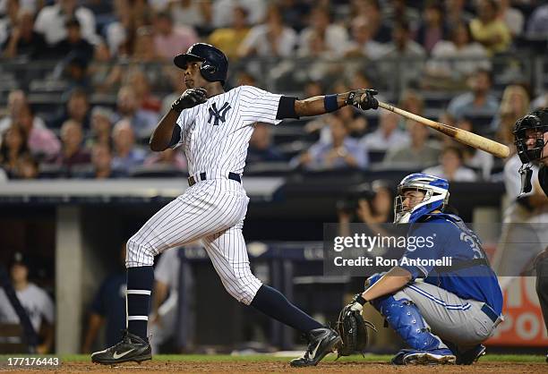 Alfonso Soriano of the Yankees 2 run home run in the 8th inning of the New York Yankees game against the Toronto Blue Jays at Yankee Stadium on...