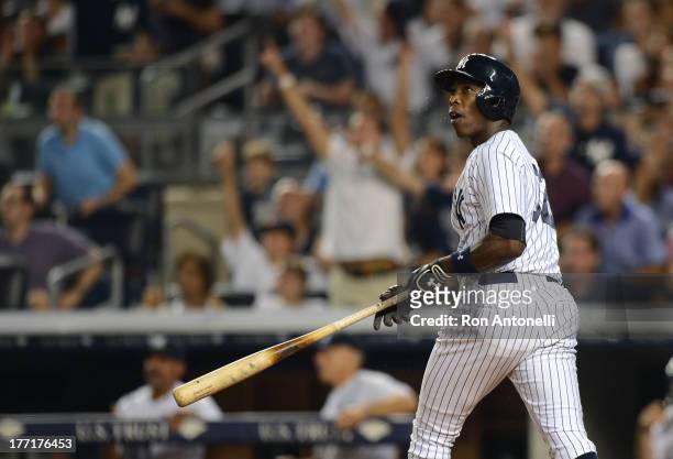 Alfonso Soriano of the Yankees 2 run home run in the 8th inning of the New York Yankees game against the Toronto Blue Jays at Yankee Stadium on...