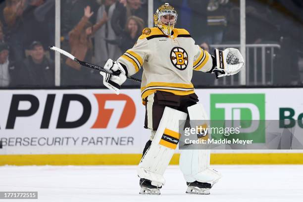 Jeremy Swayman of the Boston Bruins celebrates after blocking a shot from Auston Matthews of the Toronto Maple Leafs to win the game a shootout at TD...