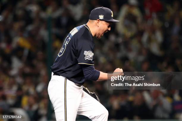 Yoshihisa Hirano of the Orix Buffaloes strikes out Yusuke Oyama of the Hanshin Tigers to end the game in the 9th inning during the Japan Series Game...