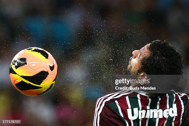 Fred of Fluminense struggles for the ball during a match between Fluminense and Goias as part of Brazilian Cup 2013 at Maracana Stadium on August 21,...