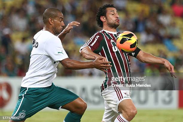 Fred of Fluminense struggles for the ball during a match between Fluminense and Goias as part of Brazilian Cup 2013 at Maracana Stadium on August 21,...