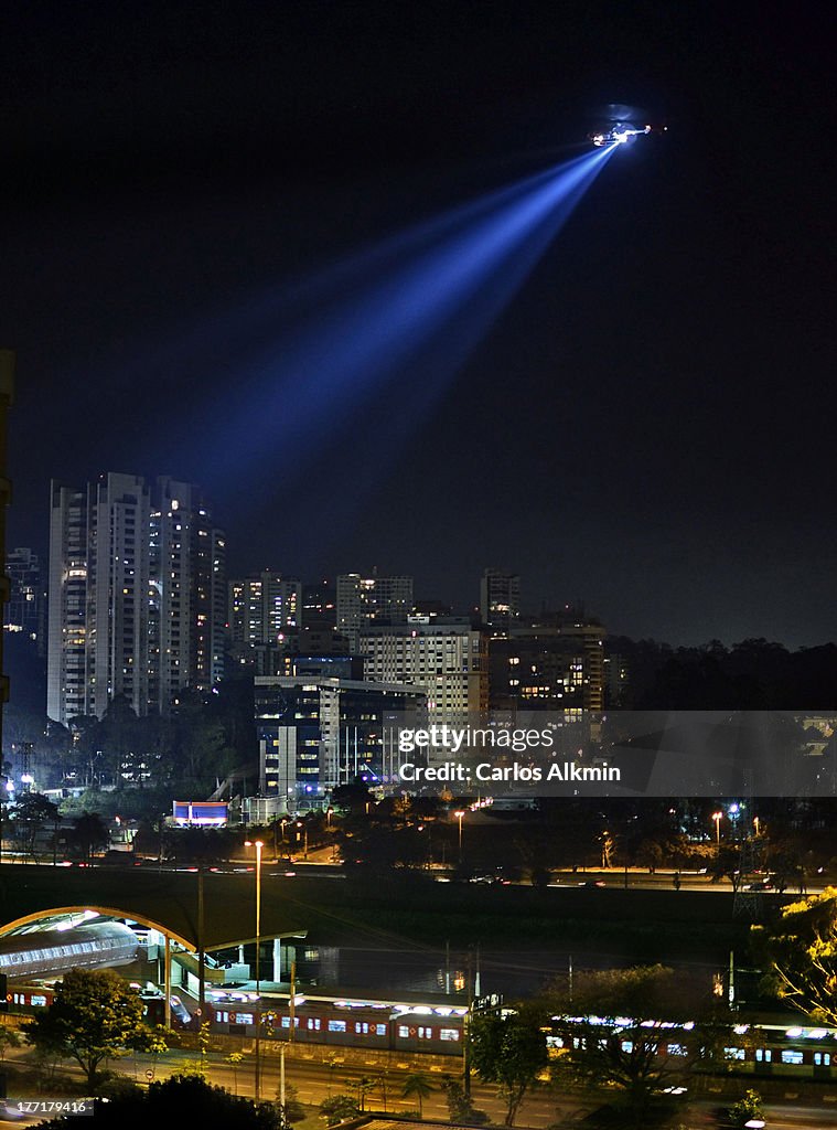 Sao Paulo night, police helicopter over station