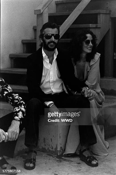 Ringo Starr and Nancy Lee Andrews attend a fashion show at the Beverly Hills home of singer Sammy Davis, Jr. On September 23, 1974.