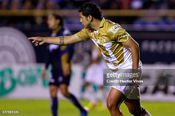Robin Ramirez of Pumas celebrates during a match between San Luis and Pumas as part of the Apertura 2013 Copa MX at Alfonso Lastras Stadium on August...