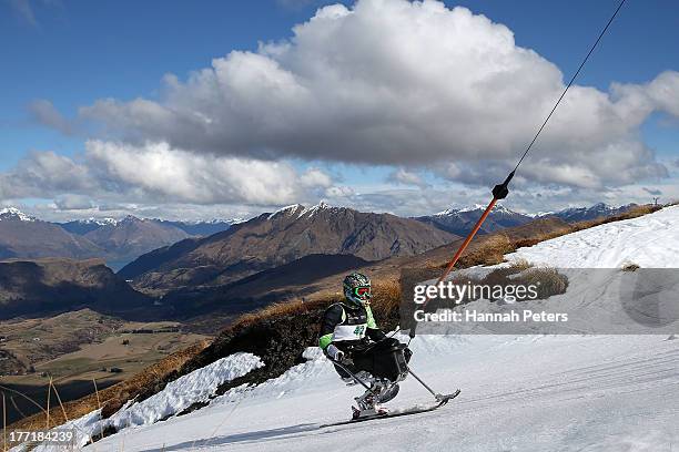 Kingsley Ward of South Africa takes a ride upto the start line in the Mens Slalom Sitting LW12-2 race during the IPC Alpine Adaptive Slalom World Cup...